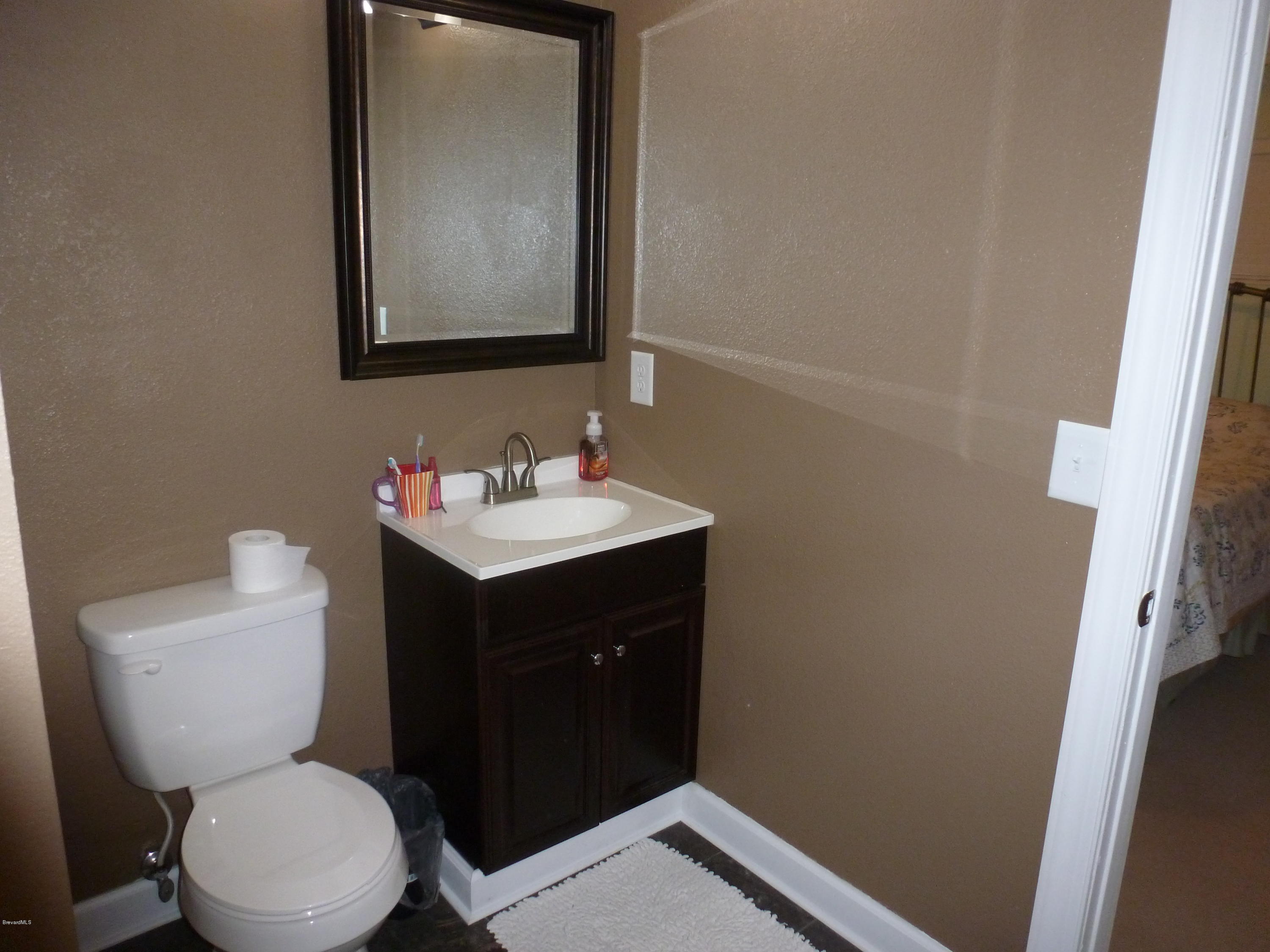 941 Lexington Road Rockledge, FL 32955 - Photo 11 of 16 Master Bath