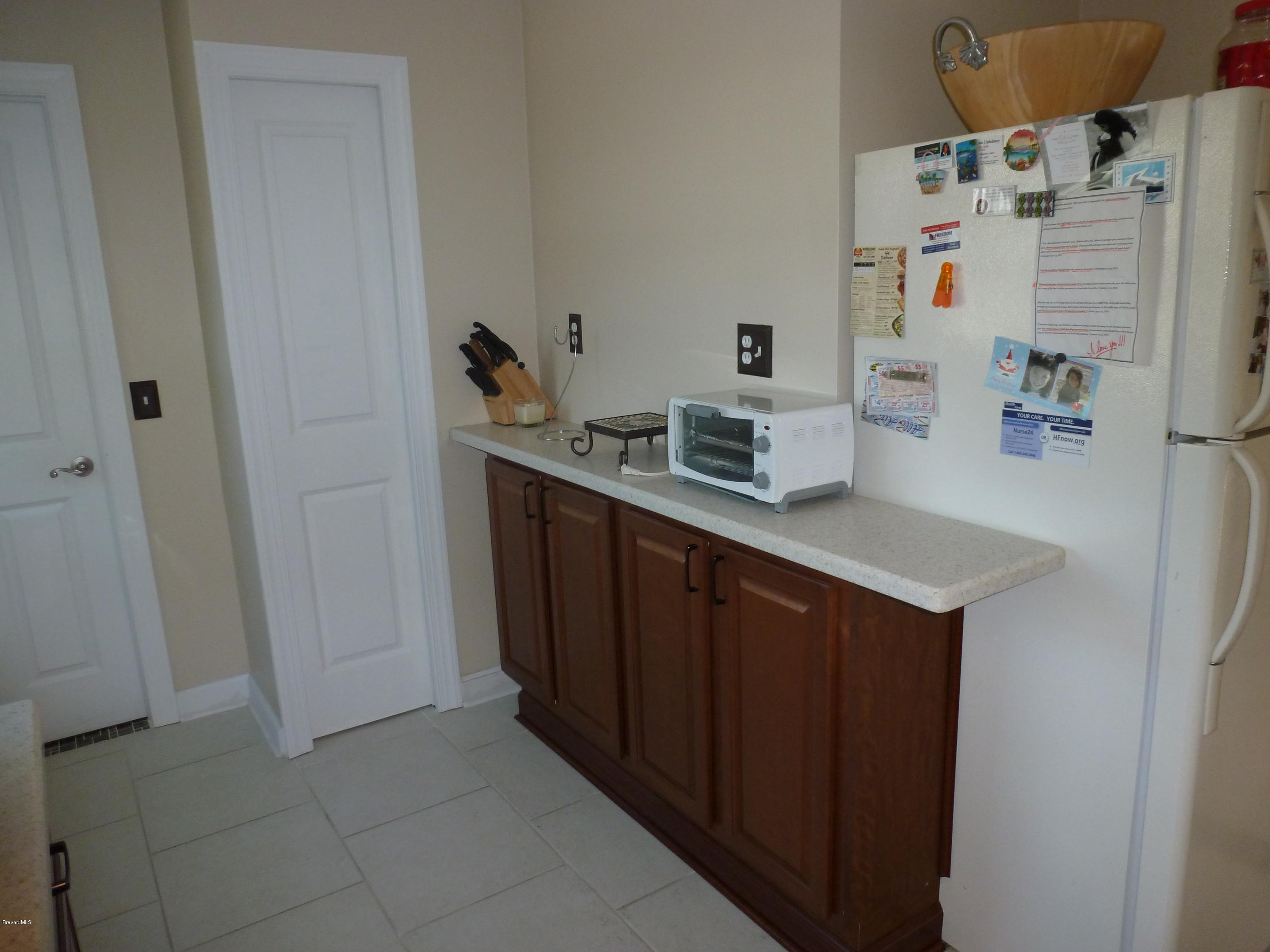 941 Lexington Road Rockledge, FL 32955 - Photo 6 of 16 Plenty Of Storage Including Pantry