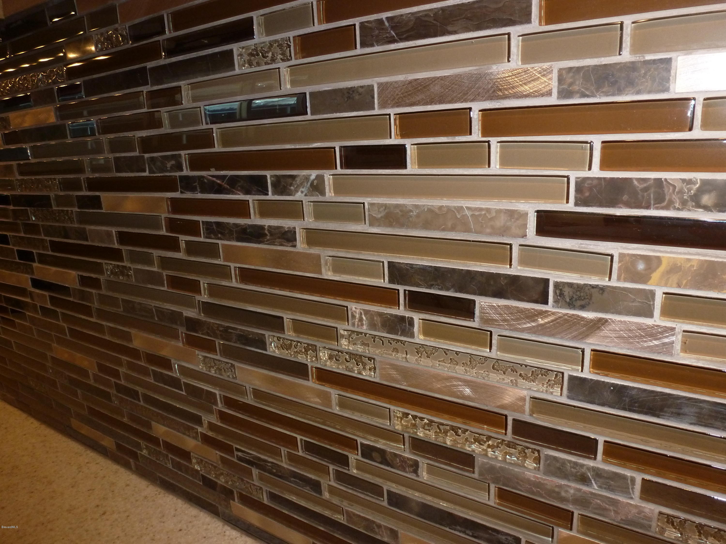 941 Lexington Road Rockledge, FL 32955 - Photo 7 of 16 Tiled Back Splash In Kitchen