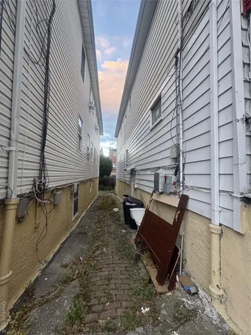 a backyard of a house with outdoor seating