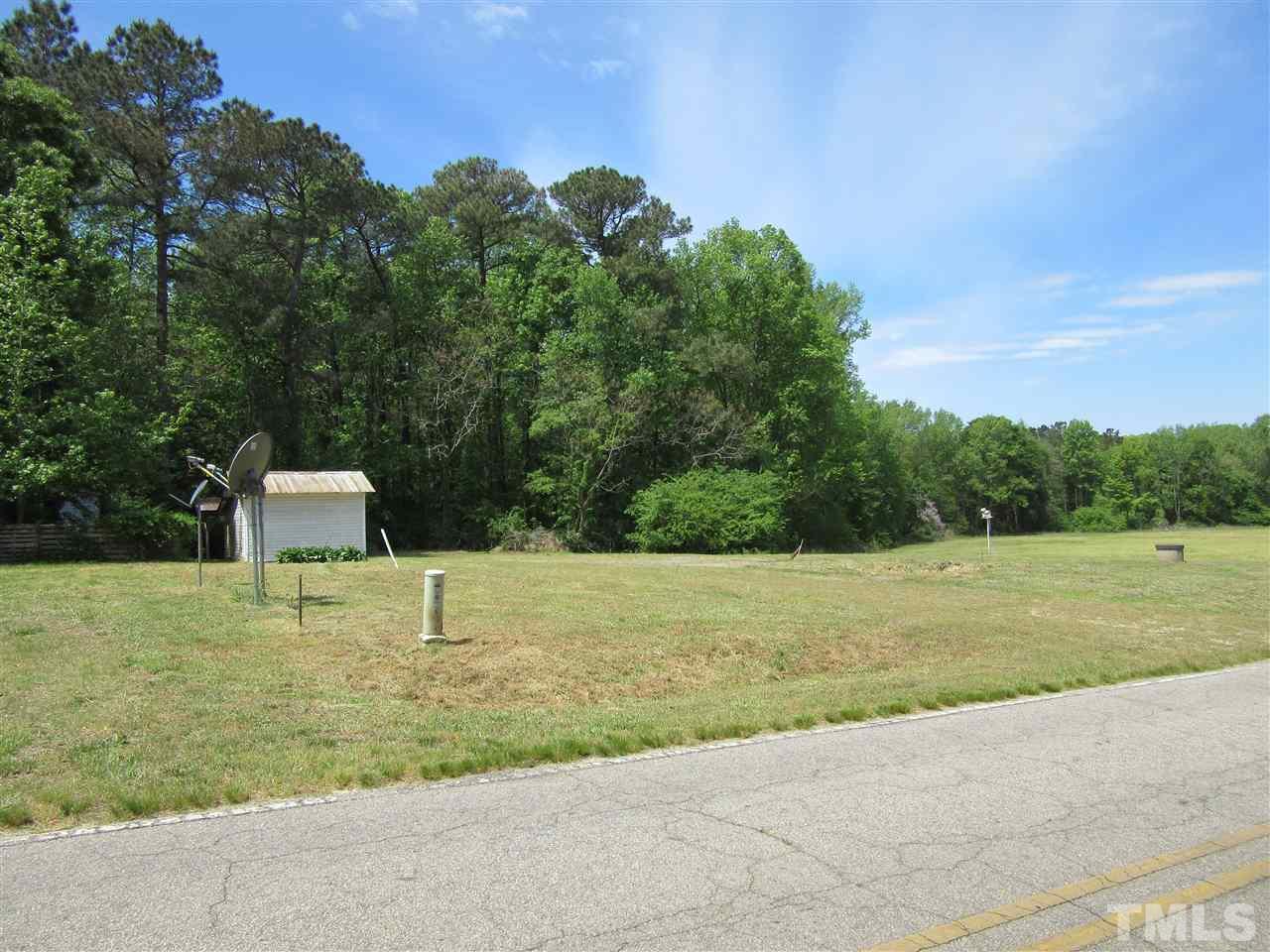 270 Tant Road Zebulon, NC 27597 - Photo 1 of 7 a garden view with a outdoor space
