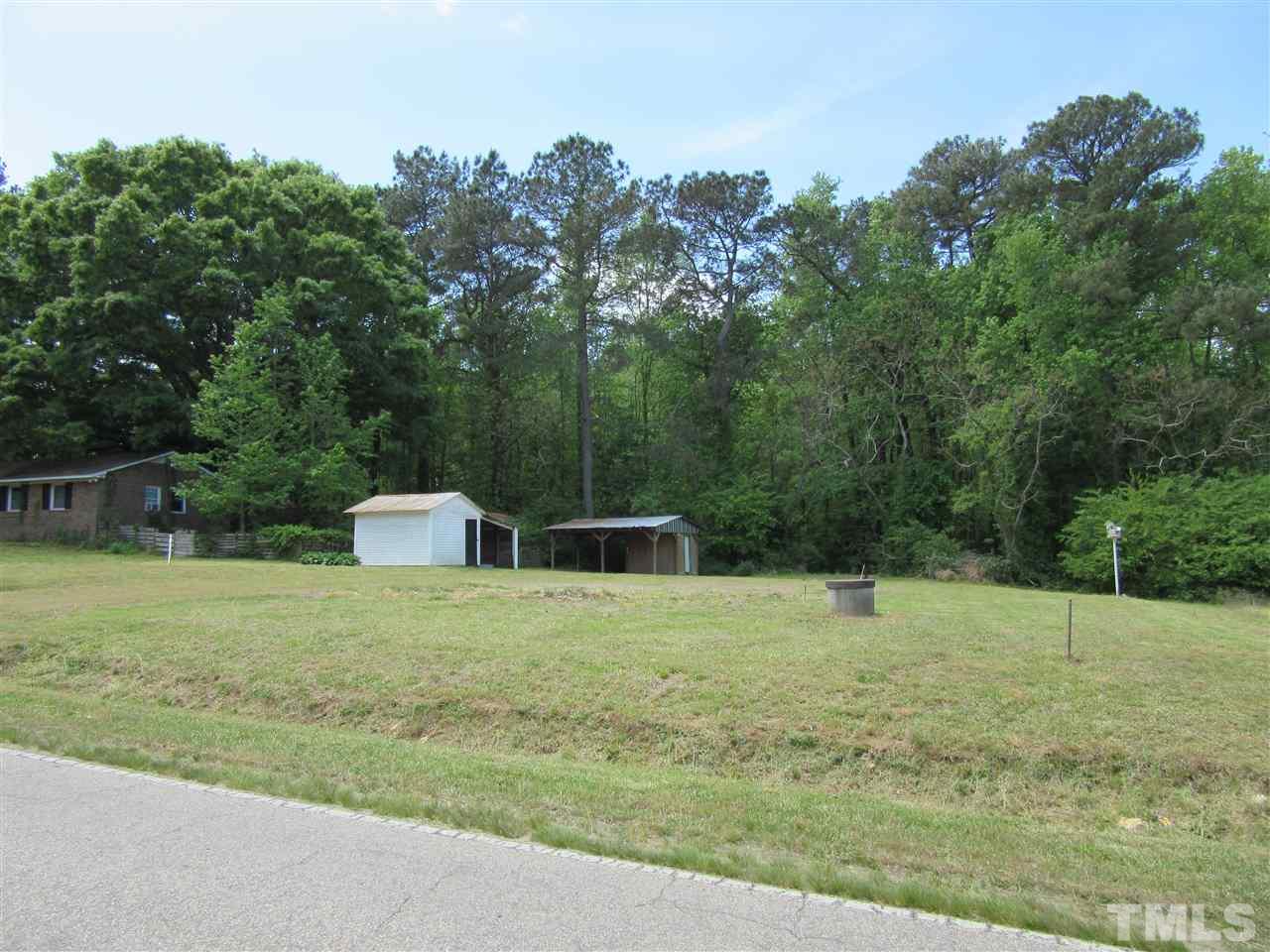 270 Tant Road Zebulon, NC 27597 - Photo 3 of 7 a backyard of a house with lots of green space