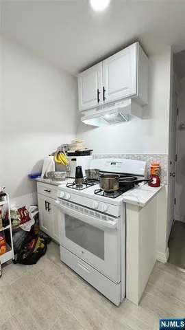 a bedroom with a bed and a dressers