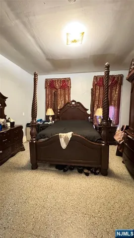 a bathroom with a toilet a sink and a mirror