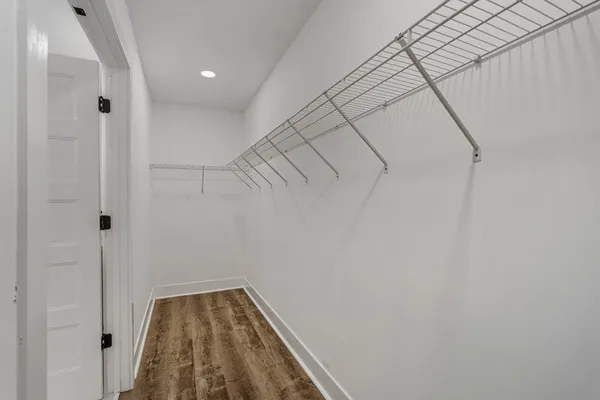 a view of a room with racks on the wall