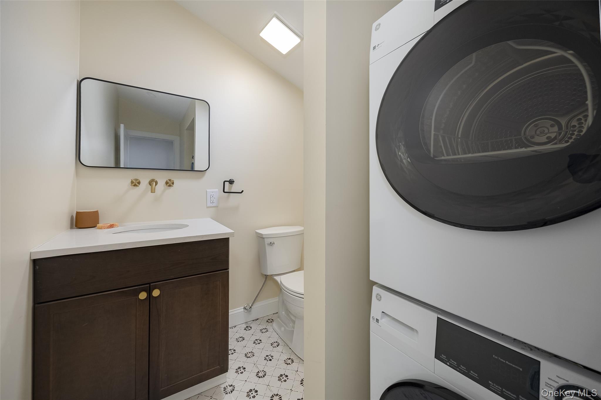 534-536 River Road Rhinebeck, NY 12572 - Photo 16 of 37 a bathroom with a sink and a mirror