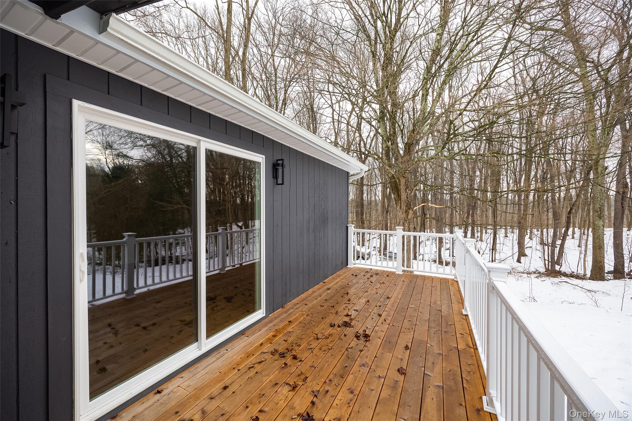 534-536 River Road Rhinebeck, NY 12572 - Photo 17 of 37 a view of balcony with wooden floor and fence