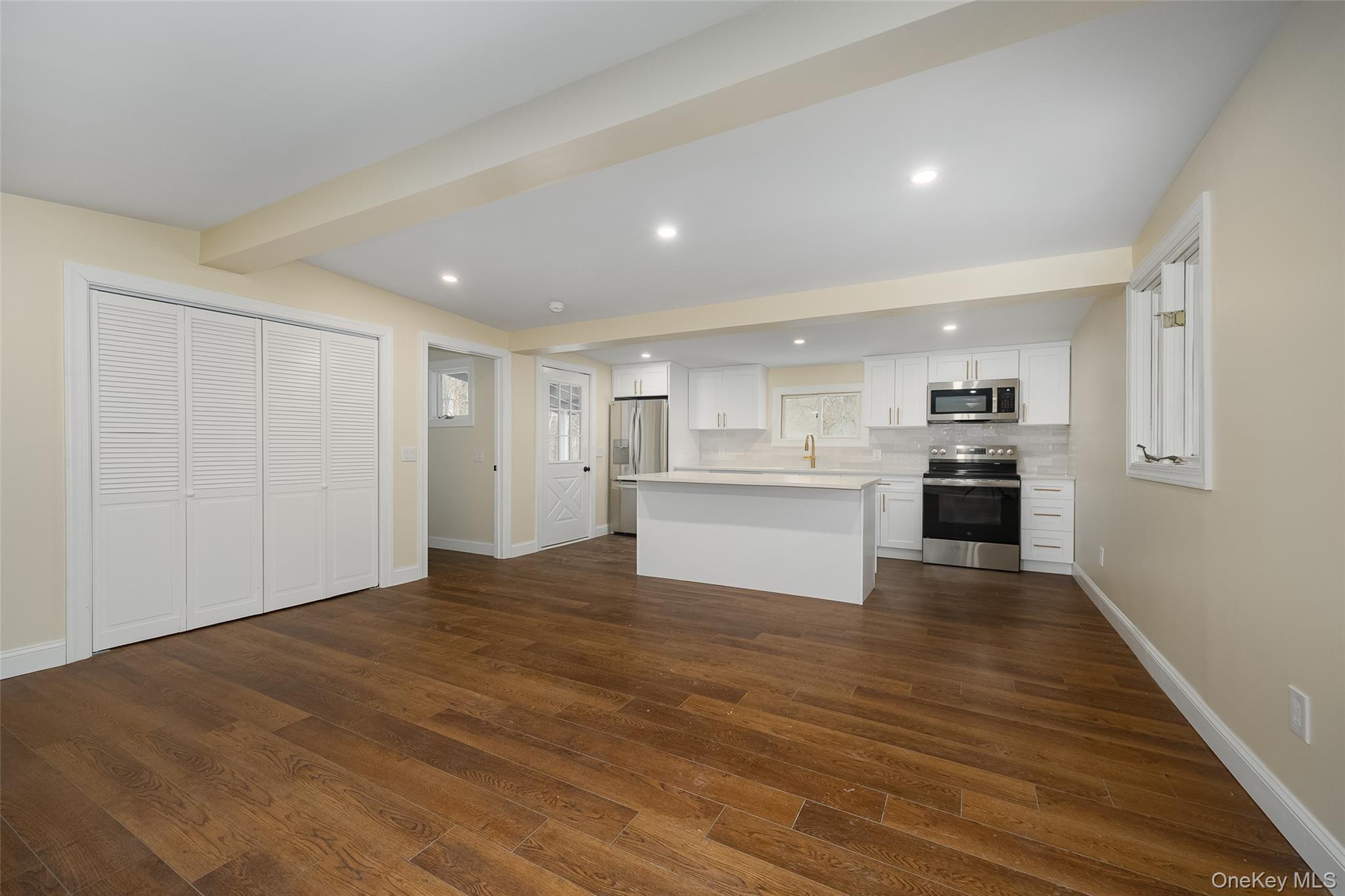 534-536 River Road Rhinebeck, NY 12572 - Photo 21 of 37 a view of a kitchen with wooden floor electronic appliances and cabinets