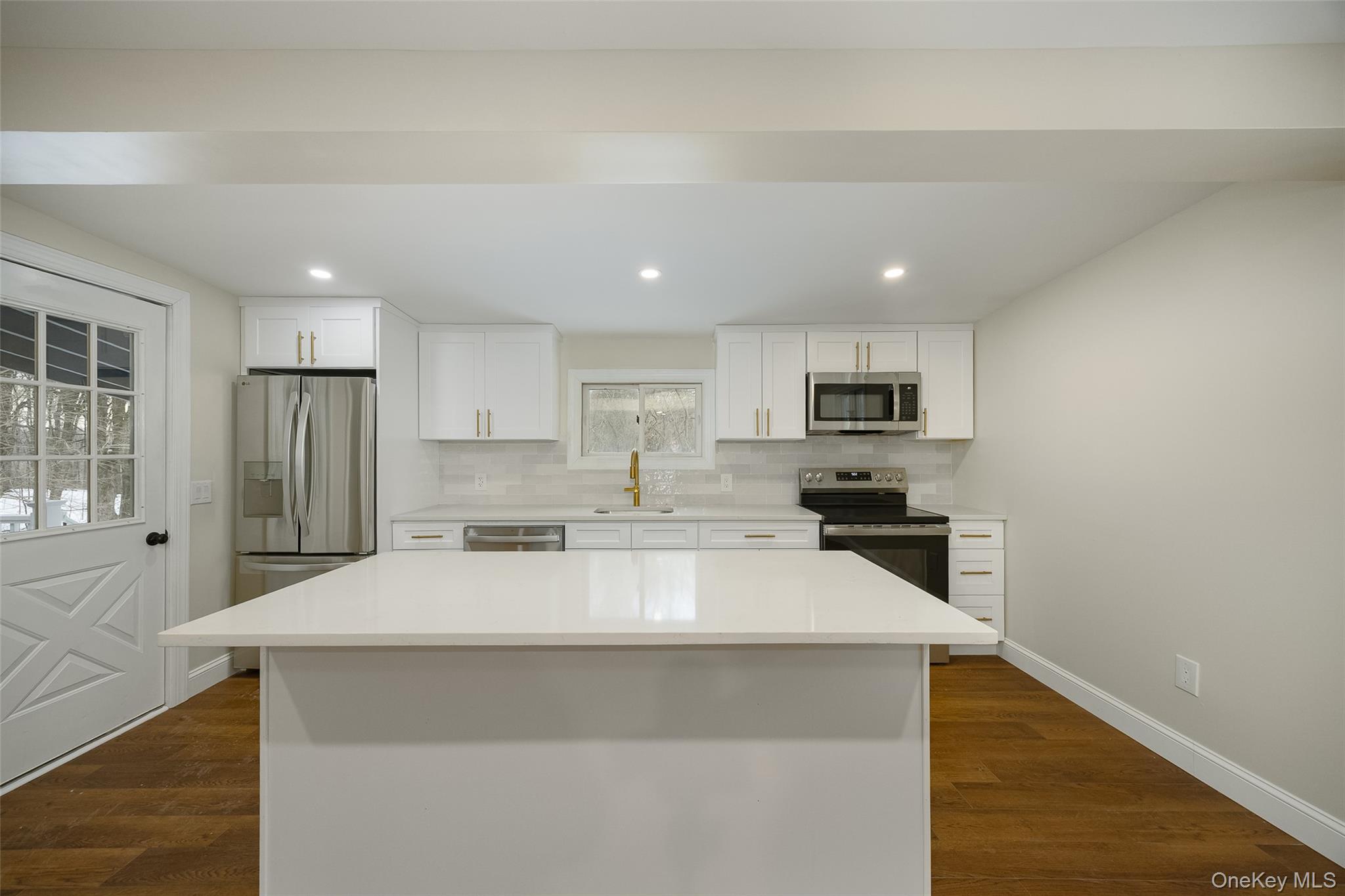 534-536 River Road Rhinebeck, NY 12572 - Photo 22 of 37 a large kitchen with kitchen island a sink stainless steel appliances and cabinets