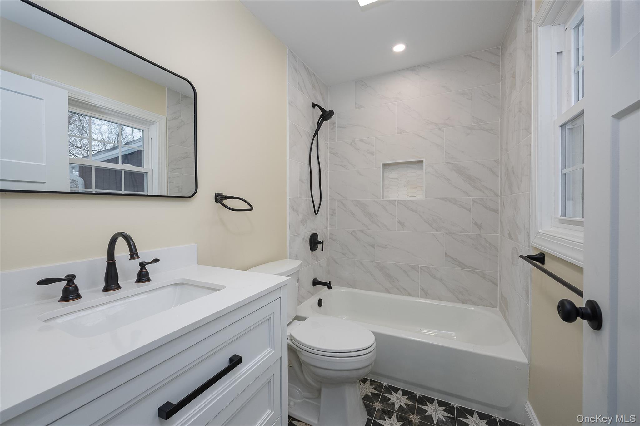534-536 River Road Rhinebeck, NY 12572 - Photo 27 of 37 a bathroom with a sink a toilet and a bathtub