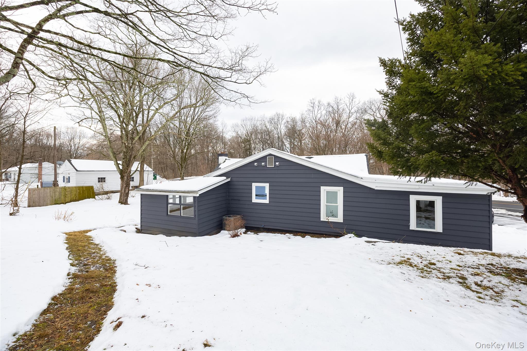 534-536 River Road Rhinebeck, NY 12572 - Photo 28 of 37 a front view of a house with a yard covered in snow