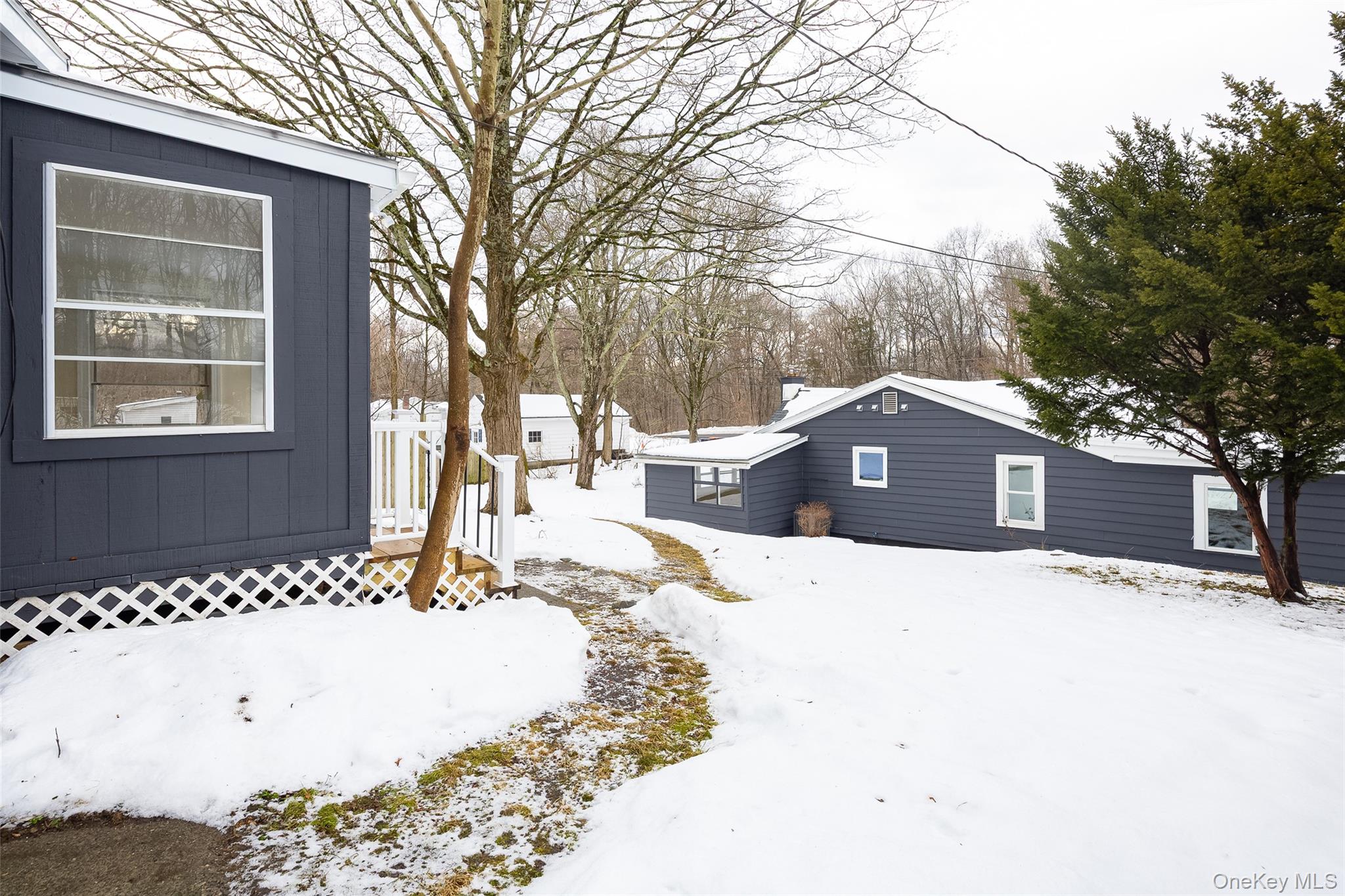 534-536 River Road Rhinebeck, NY 12572 - Photo 29 of 37 a front view of a house with a yard covered in snow