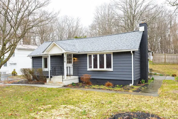 a view of swimming pool with outdoor seating