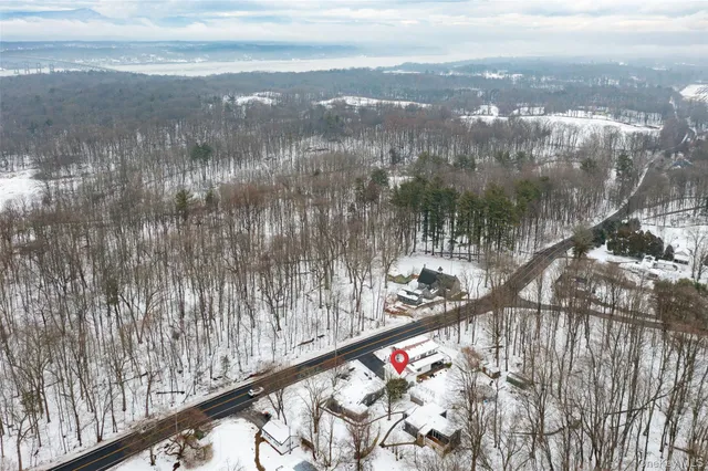 a view of snow on the road