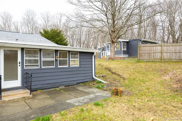 a front view of a house with swimming pool