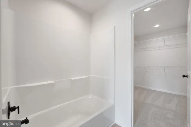 a close view of a bathtub in bathroom