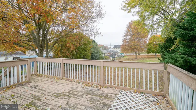 a view of a wooden fence