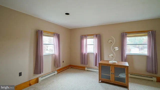a view of an empty room with window