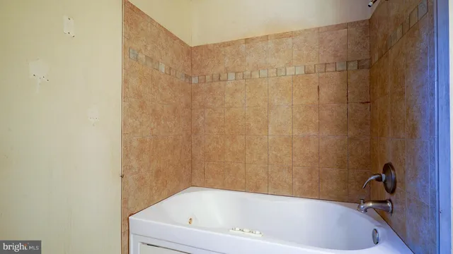 a bathroom with a bathtub