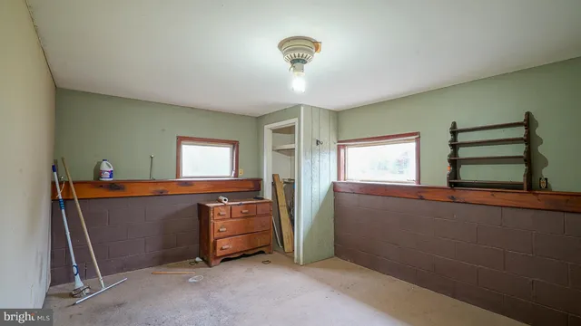 a room with window and closet