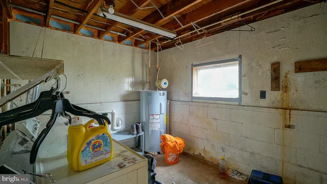 a bathroom with a toilet and shower