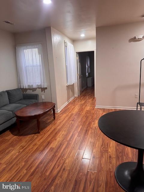 611 North 32nd Street Philadelphia, PA 19104 - Photo 15 of 15 a living room with furniture and a wooden floor