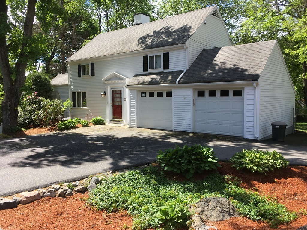 41 Watertown Street Lexington, MA 02421 - Photo 1 of 23 a front view of a house with a yard