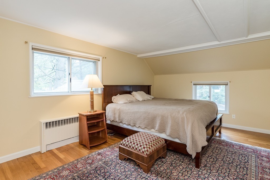 41 Watertown Street Lexington, MA 02421 - Photo 13 of 23 a bedroom with a bed and a window