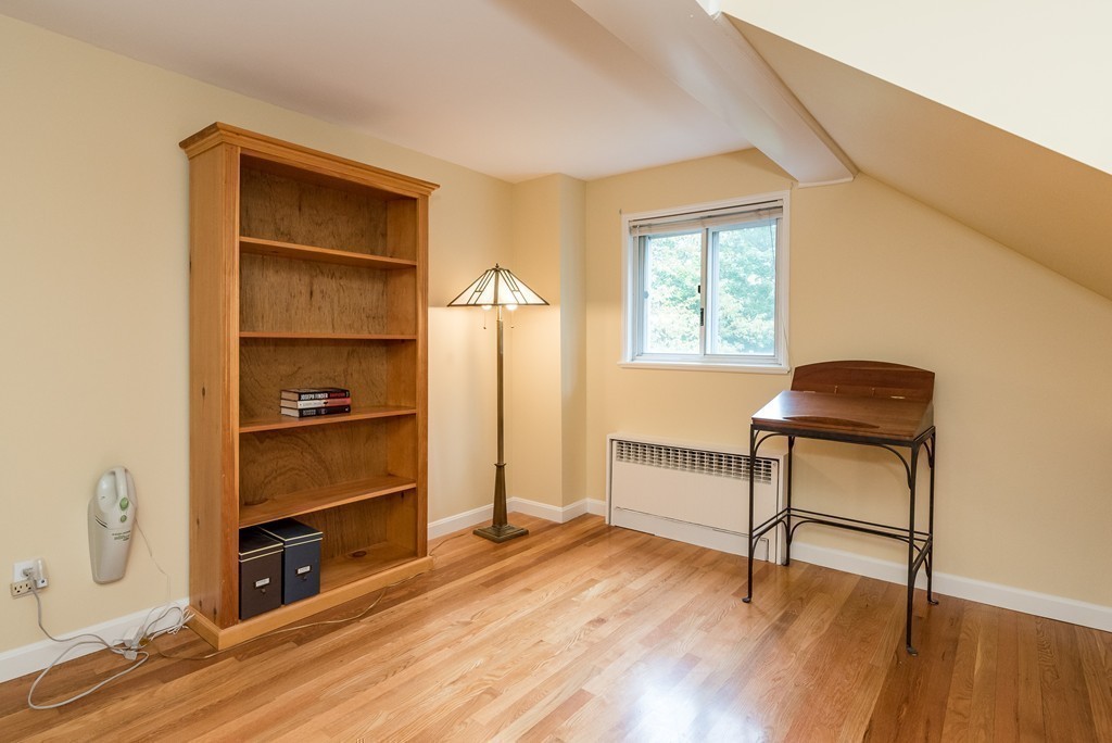 41 Watertown Street Lexington, MA 02421 - Photo 17 of 23 a view of room with window and wooden floor