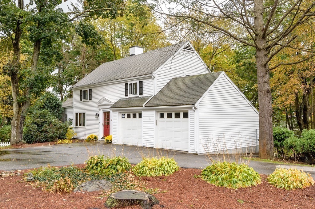 41 Watertown Street Lexington, MA 02421 - Photo 21 of 23 a view of a white house with a yard