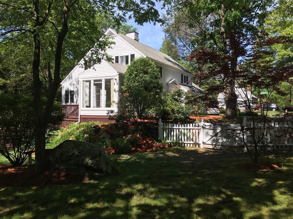 41 Watertown Street Lexington, MA 02421 - Photo 22 of 23 a front view of a house with garden
