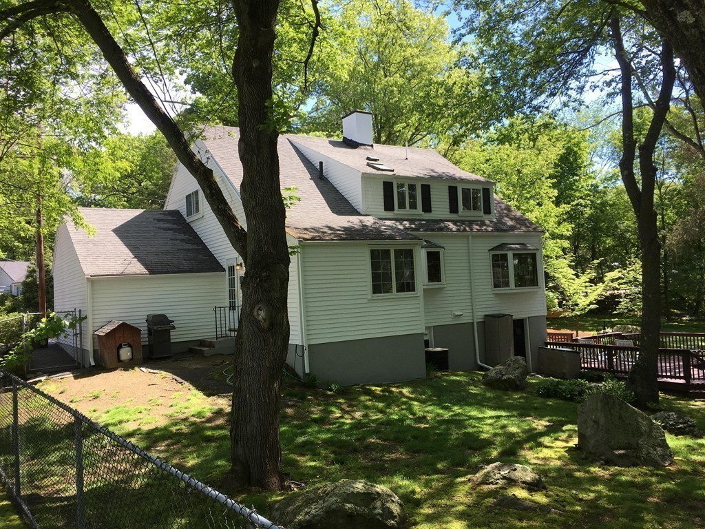 41 Watertown Street Lexington, MA 02421 - Photo 23 of 23 a aerial view of a house with large trees and a yard