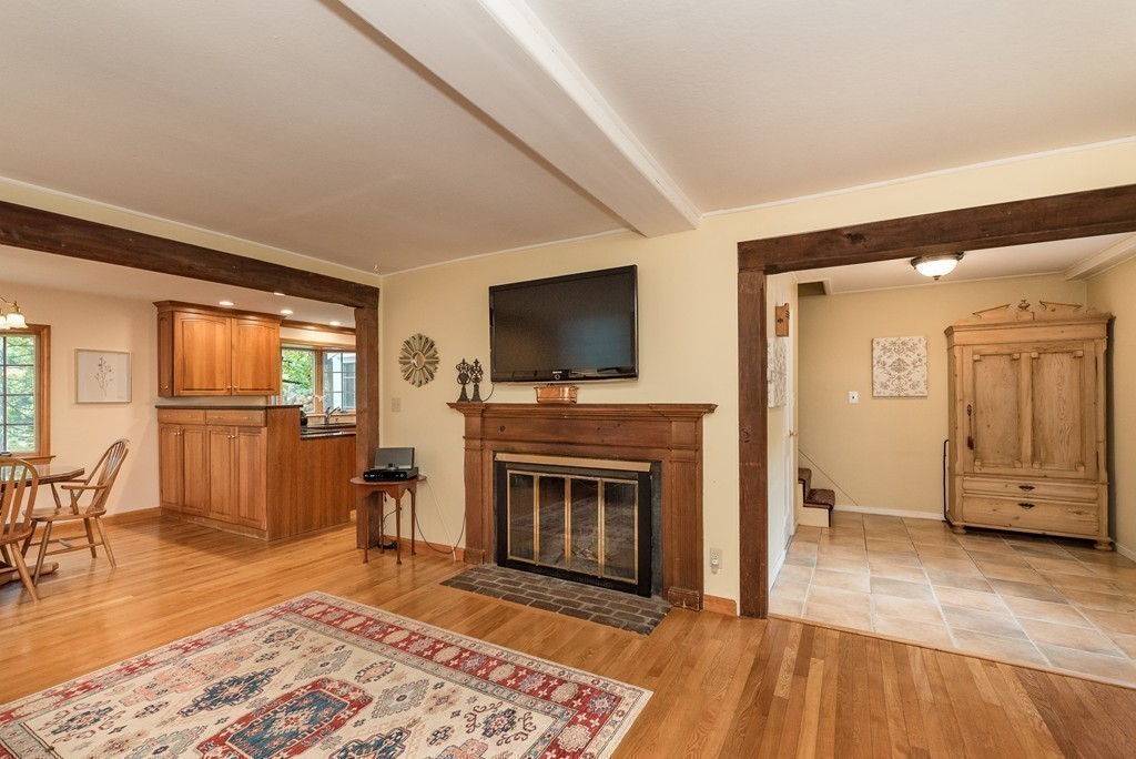 41 Watertown Street Lexington, MA 02421 - Photo 8 of 23 a living room with furniture and a fireplace
