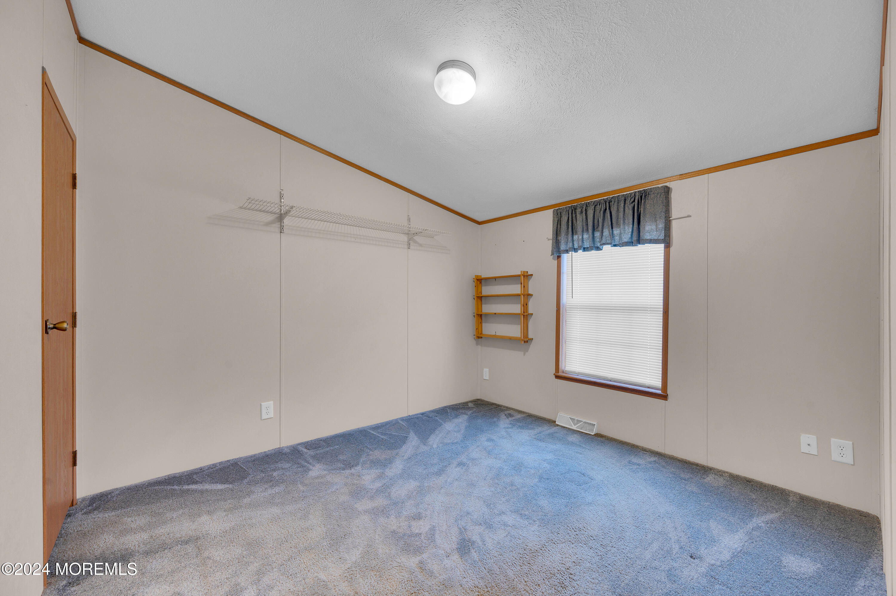 2 Baltimore Avenue Manahawkin, NJ 08050 - Photo 14 of 20 a view of an empty room with a window