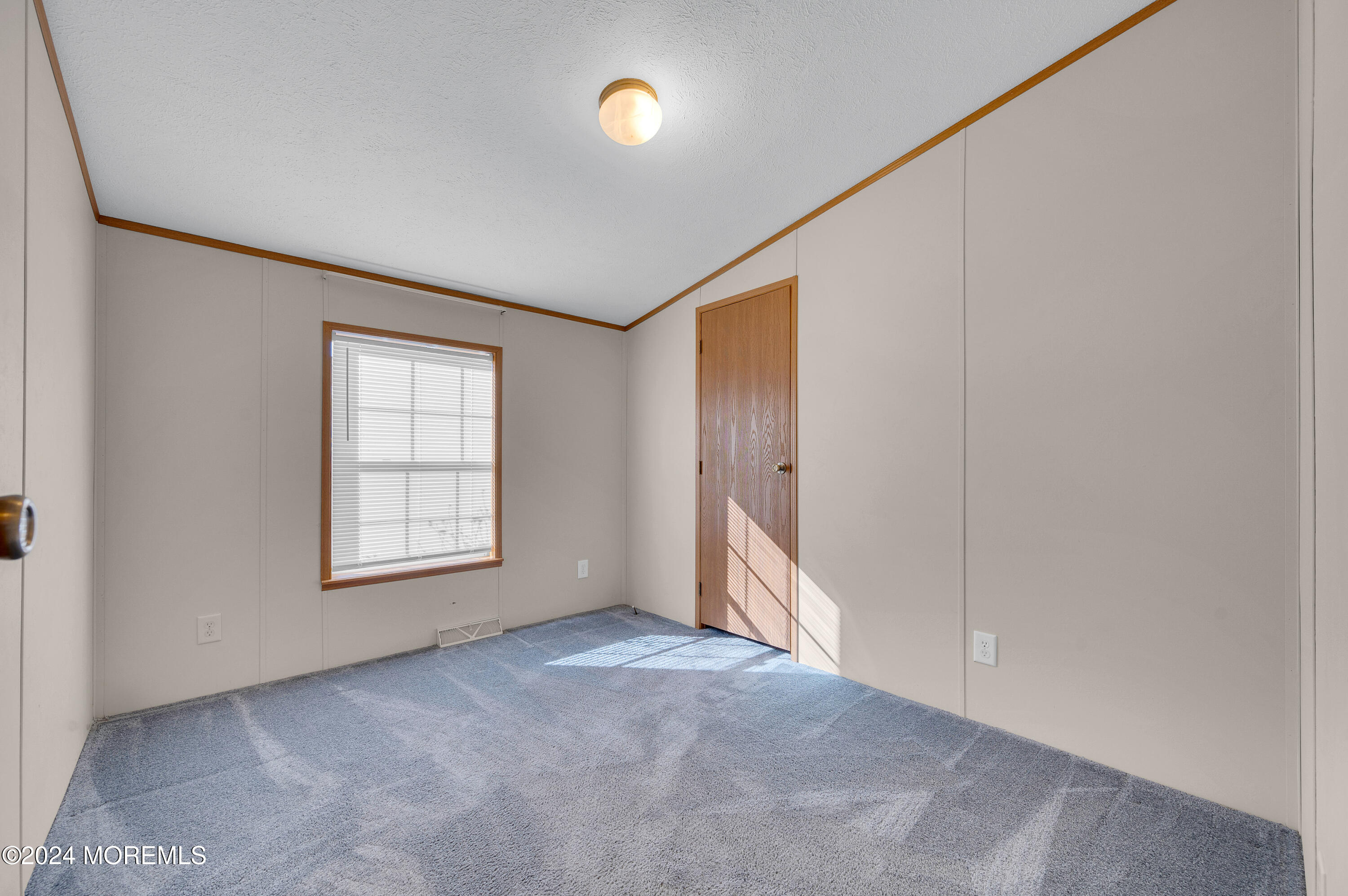 2 Baltimore Avenue Manahawkin, NJ 08050 - Photo 15 of 20 an empty room with windows