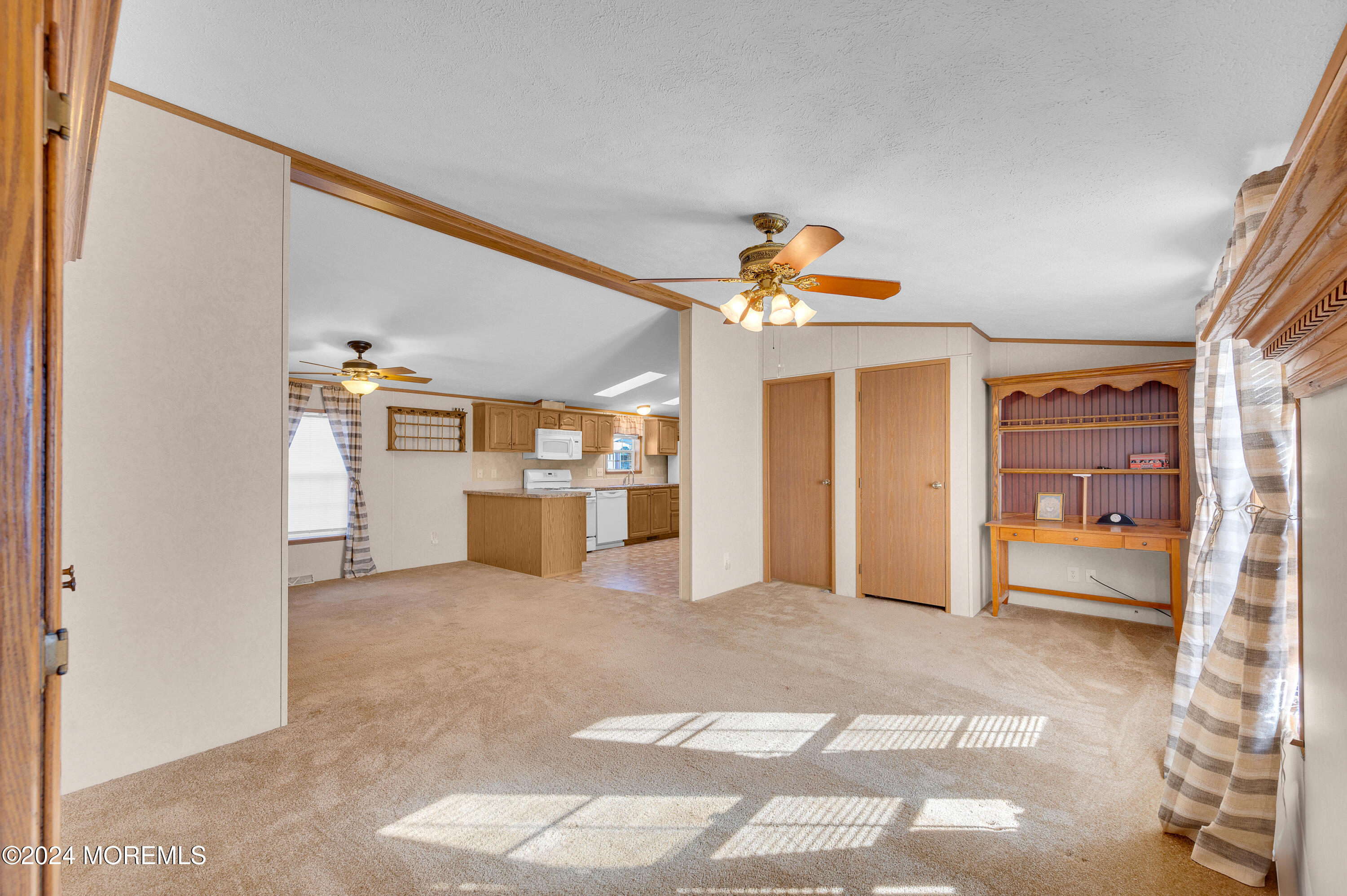 2 Baltimore Avenue Manahawkin, NJ 08050 - Photo 3 of 20 a view of livingroom with hardwood floor and a kitchen