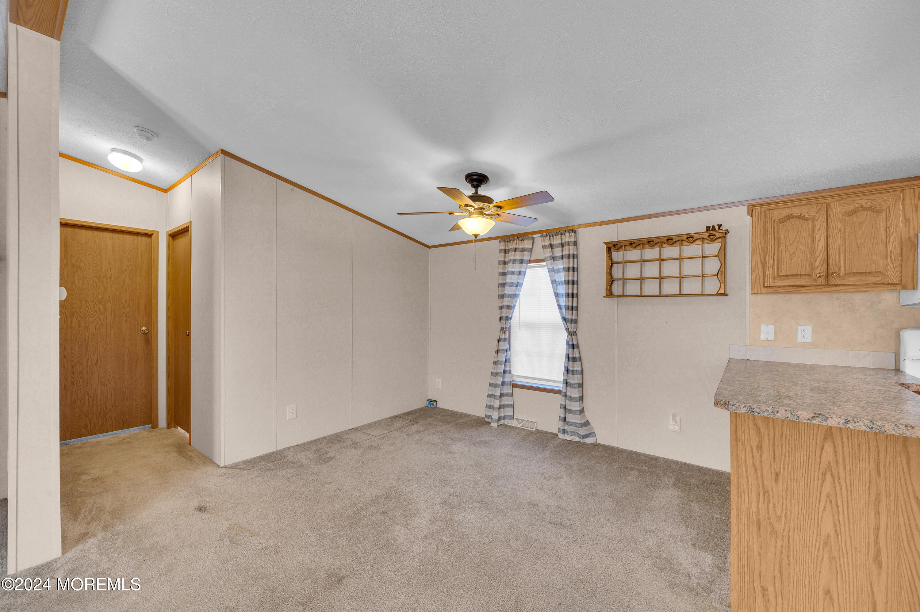 2 Baltimore Avenue Manahawkin, NJ 08050 - Photo 6 of 20 a view of a livingroom with an empty space