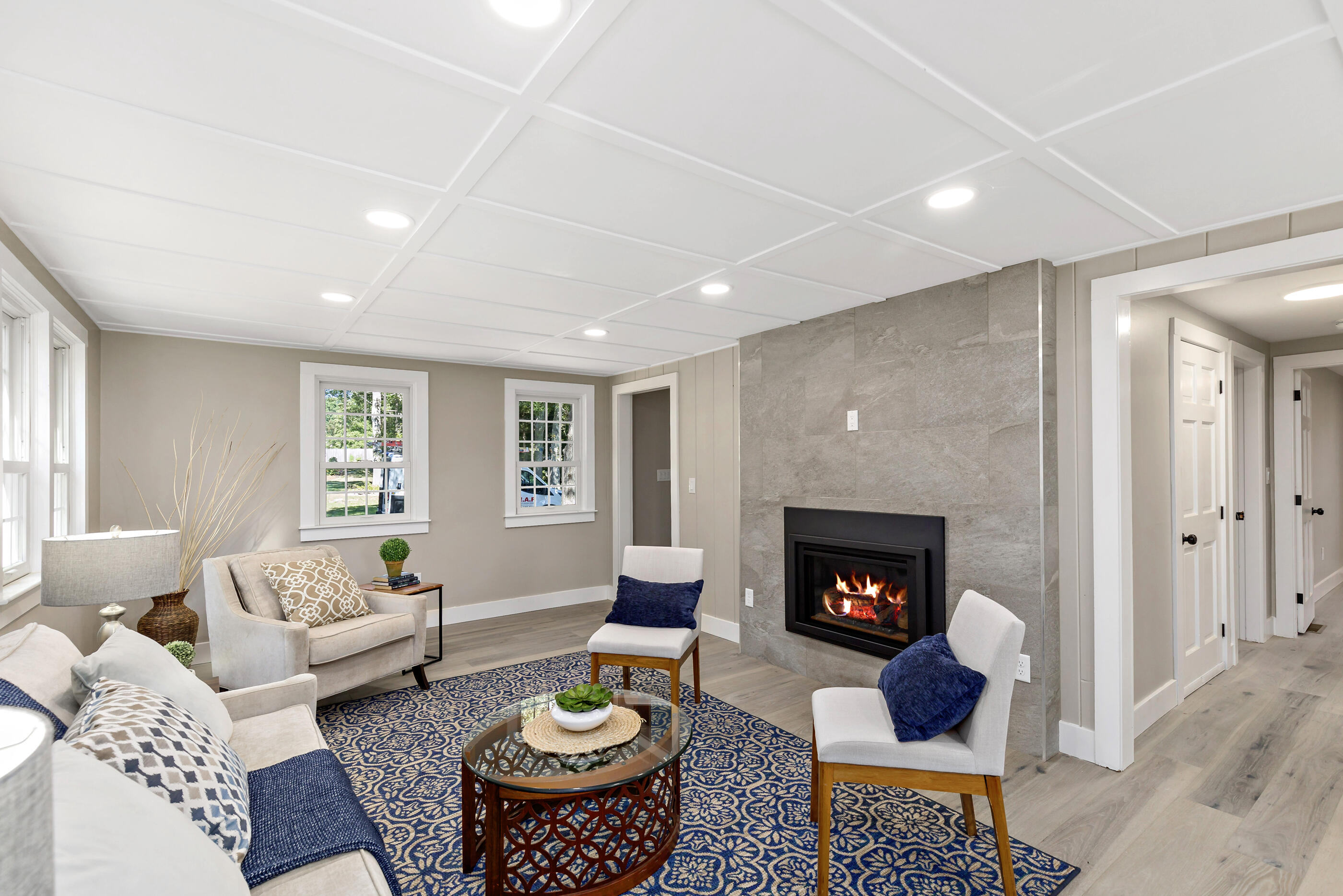 53 Monument Neck Road Bourne, MA 02532 - Photo 22 of 44 a living room with furniture and a fireplace