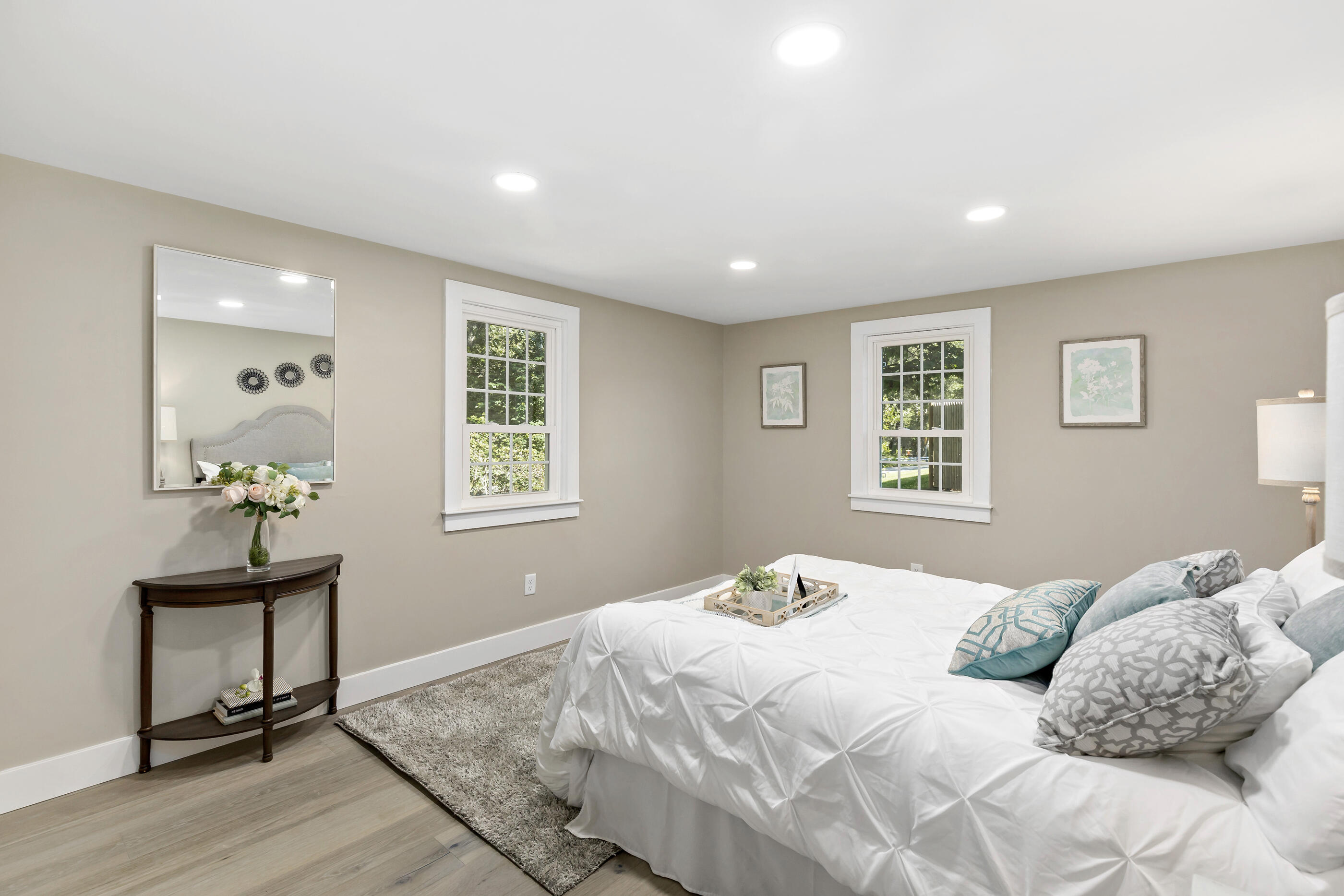 53 Monument Neck Road Bourne, MA 02532 - Photo 26 of 44 a bedroom with a bed and windows
