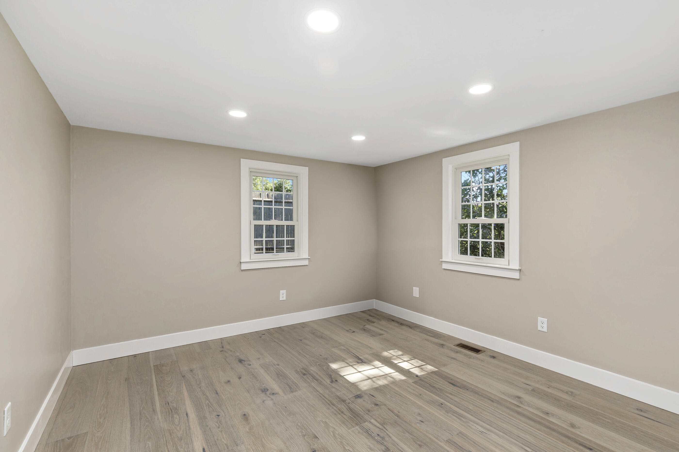 53 Monument Neck Road Bourne, MA 02532 - Photo 29 of 44 a view of empty room with wooden floor and fan