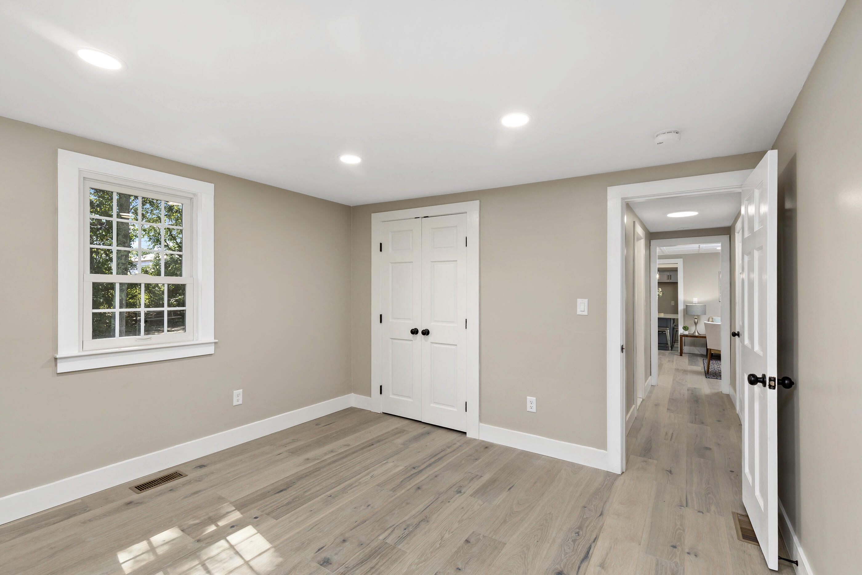53 Monument Neck Road Bourne, MA 02532 - Photo 30 of 44 wooden floor in an empty room with a window