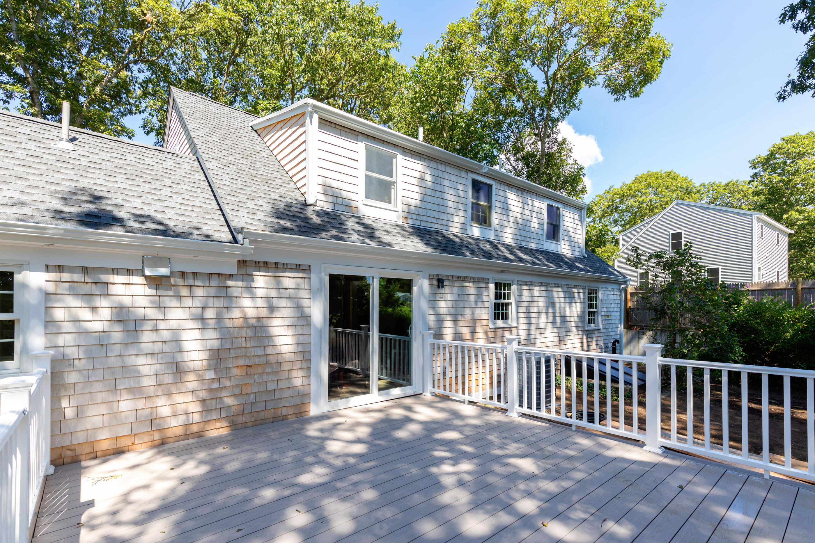 53 Monument Neck Road Bourne, MA 02532 - Photo 3 of 44 a view of a house with a yard