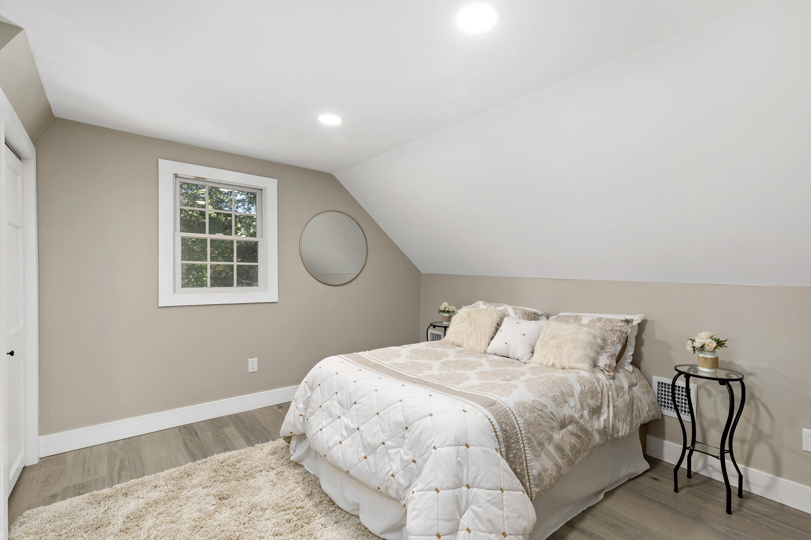 53 Monument Neck Road Bourne, MA 02532 - Photo 36 of 44 a bedroom with a bed and a window