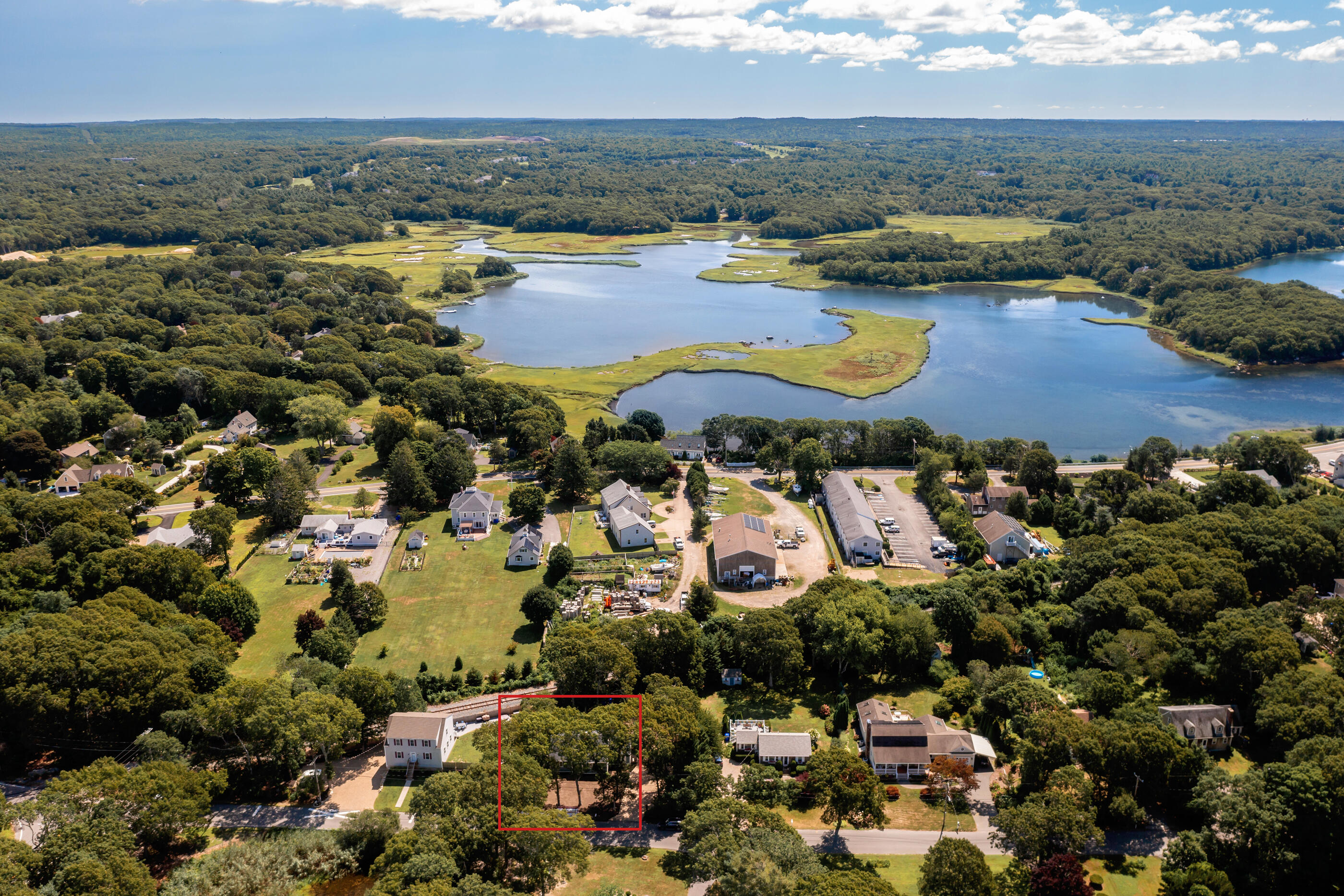 53 Monument Neck Road Bourne, MA 02532 - Photo 42 of 44 an aerial view of residential houses with outdoor space