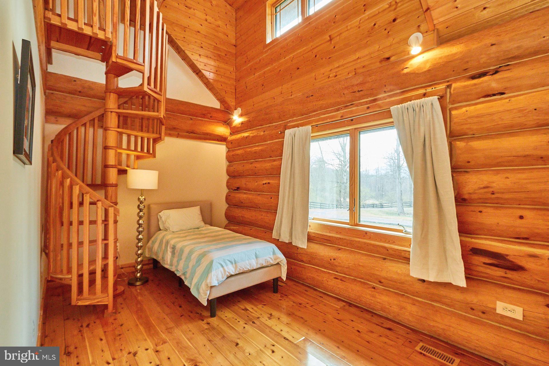 14047 Hume Road Hume, VA 22639 - Photo 34 of 73 Main Level Bedroom w/Spiral Staircase to library