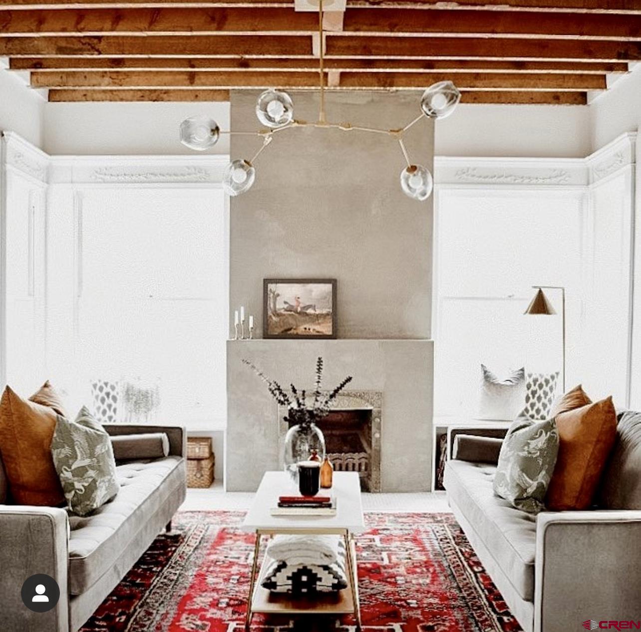 509 Leon Street Delta, CO 81416 - Photo 19 of 35 a living room with furniture and a couch