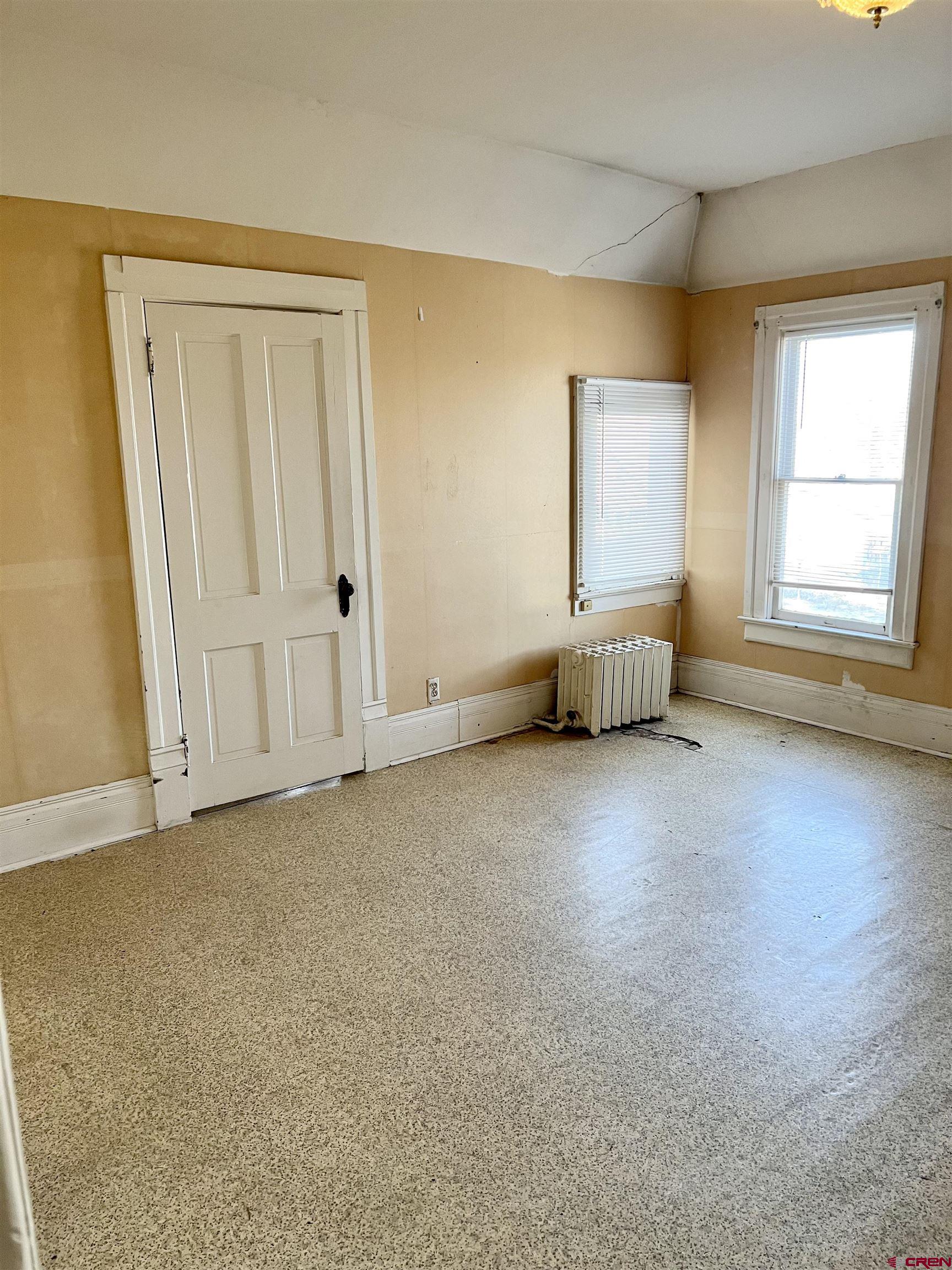 509 Leon Street Delta, CO 81416 - Photo 31 of 35 a view of an empty room with a window