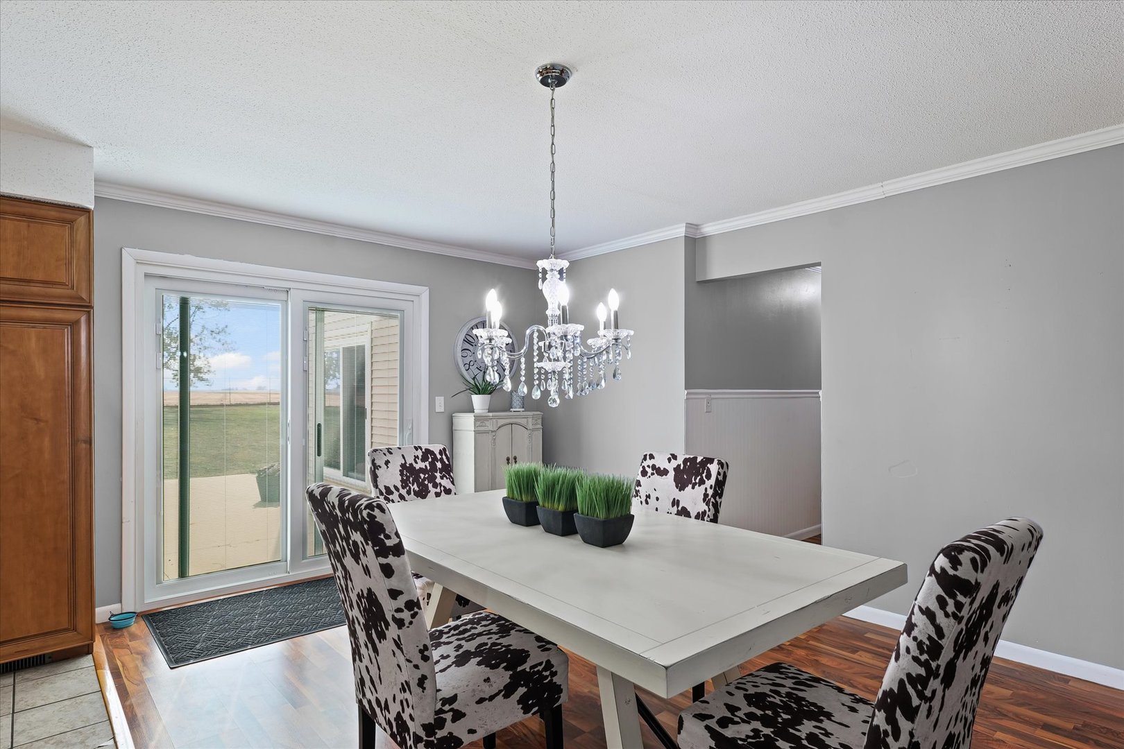 1707 West Old Church Road Champaign, IL 61822 - Photo 18 of 32 a view of a dining room with furniture and chandelier
