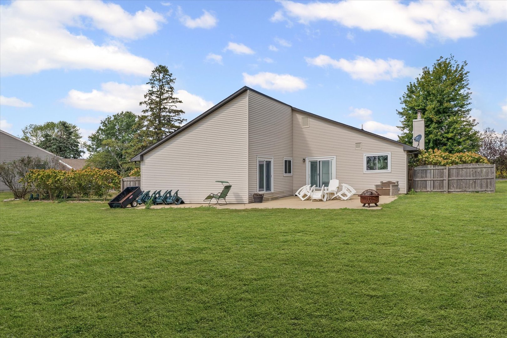 1707 West Old Church Road Champaign, IL 61822 - Photo 31 of 32 a view of a white house with a big yard