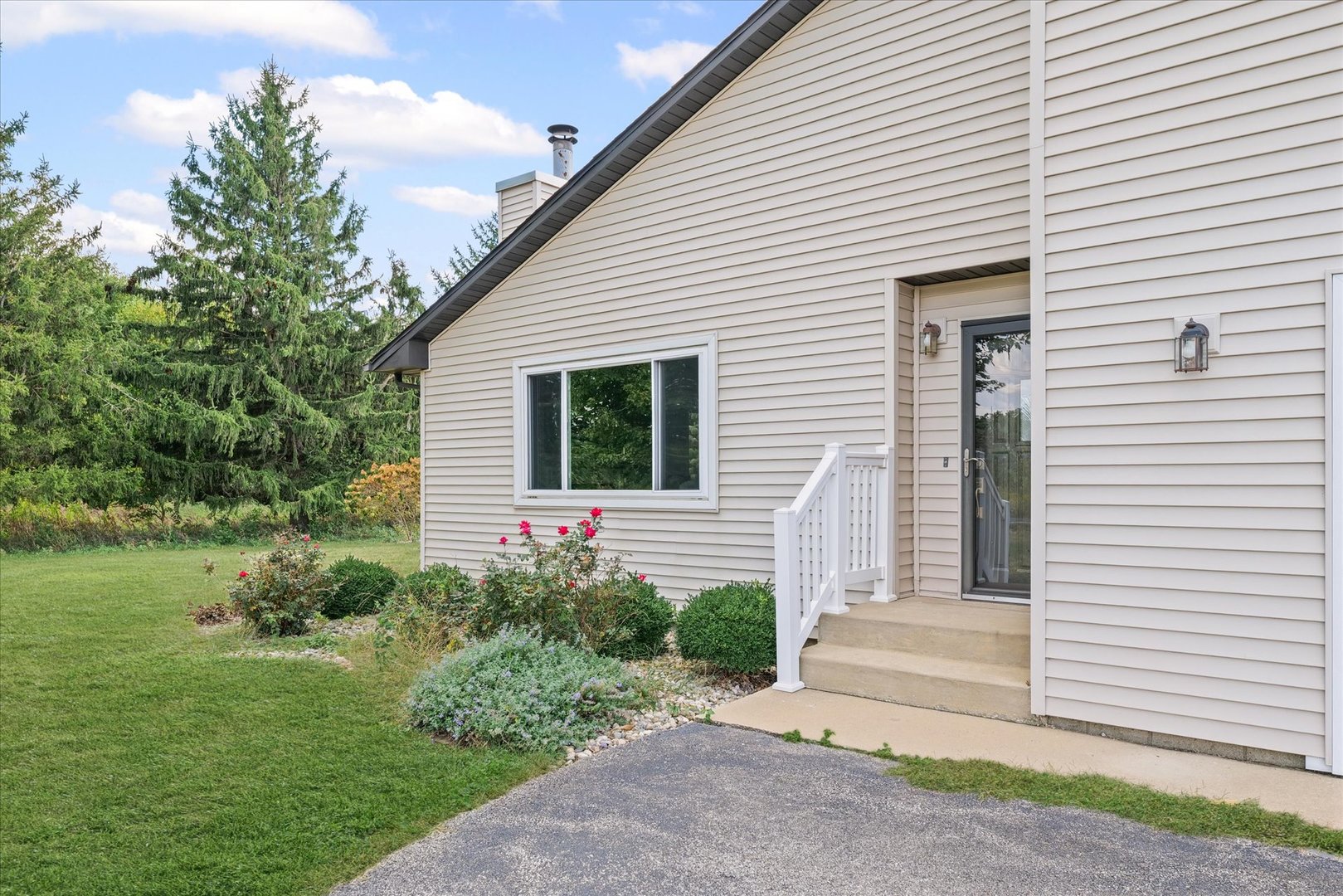 1707 West Old Church Road Champaign, IL 61822 - Photo 5 of 32 a view of a house with a yard